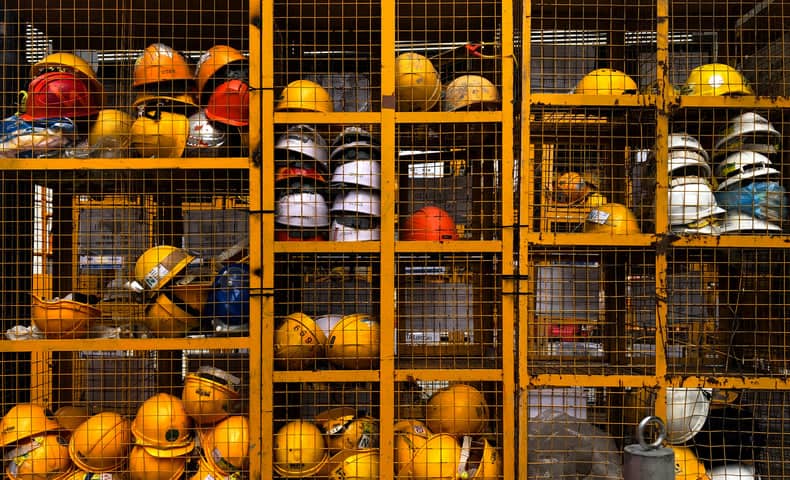 hard hat helmets in warehouse shelves