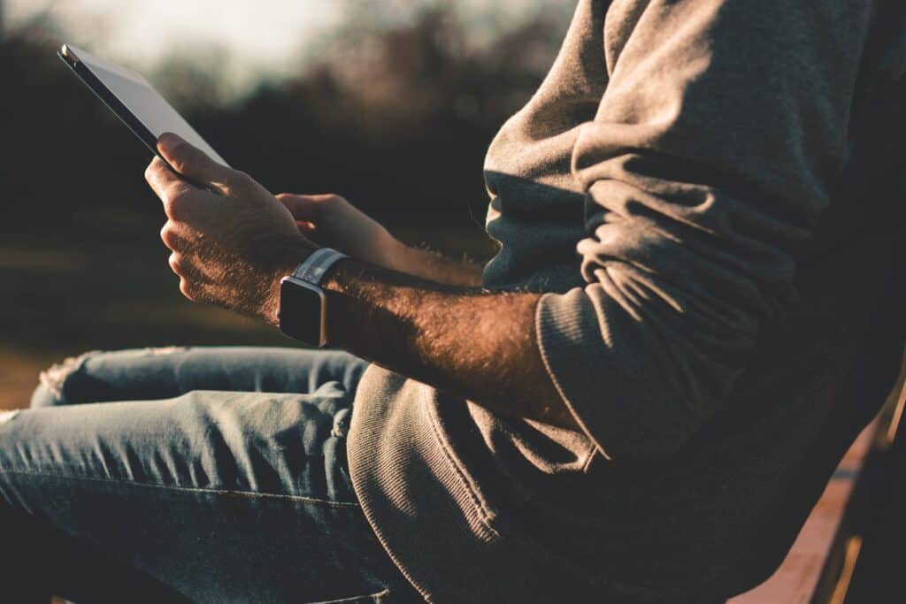 man holding tablet