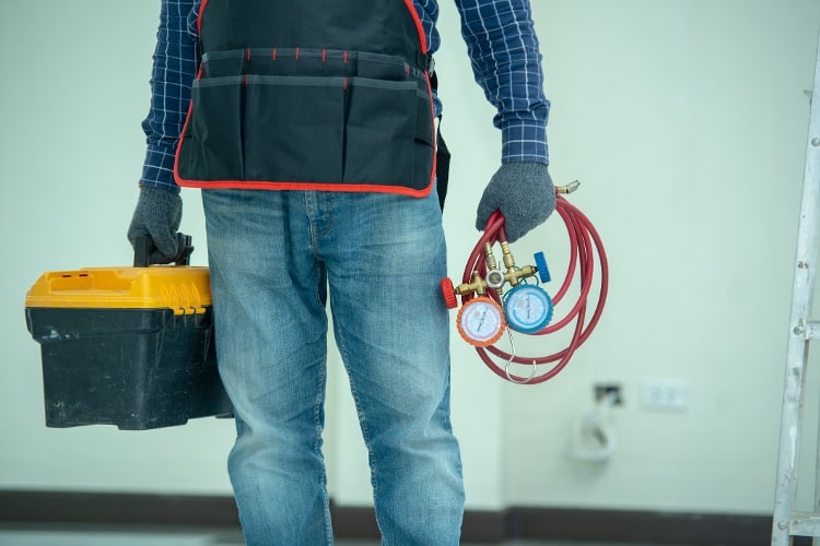 Service worker helping with HVAC support