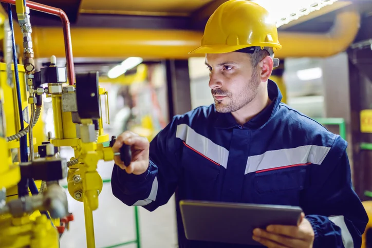 Technician working on valves