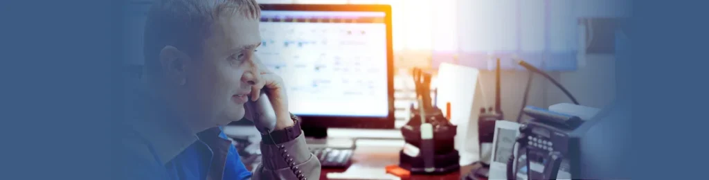 business man talking on the phone at his desk